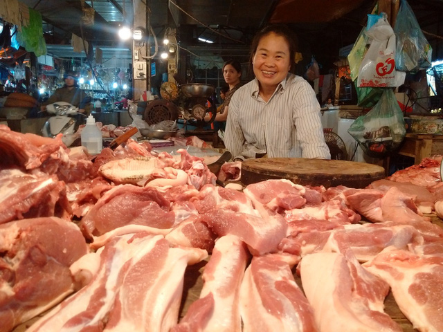 Hình ảnh người bán thịt lợn